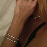 Round Cut Diamond Tennis Bracelet in Enlargement Setting