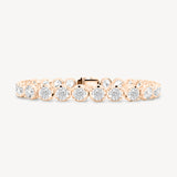 Round Cut Diamond Tennis Bracelet in Enlargement Setting