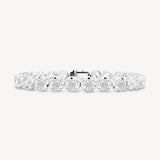 Round Cut Diamond Tennis Bracelet in Enlargement Setting