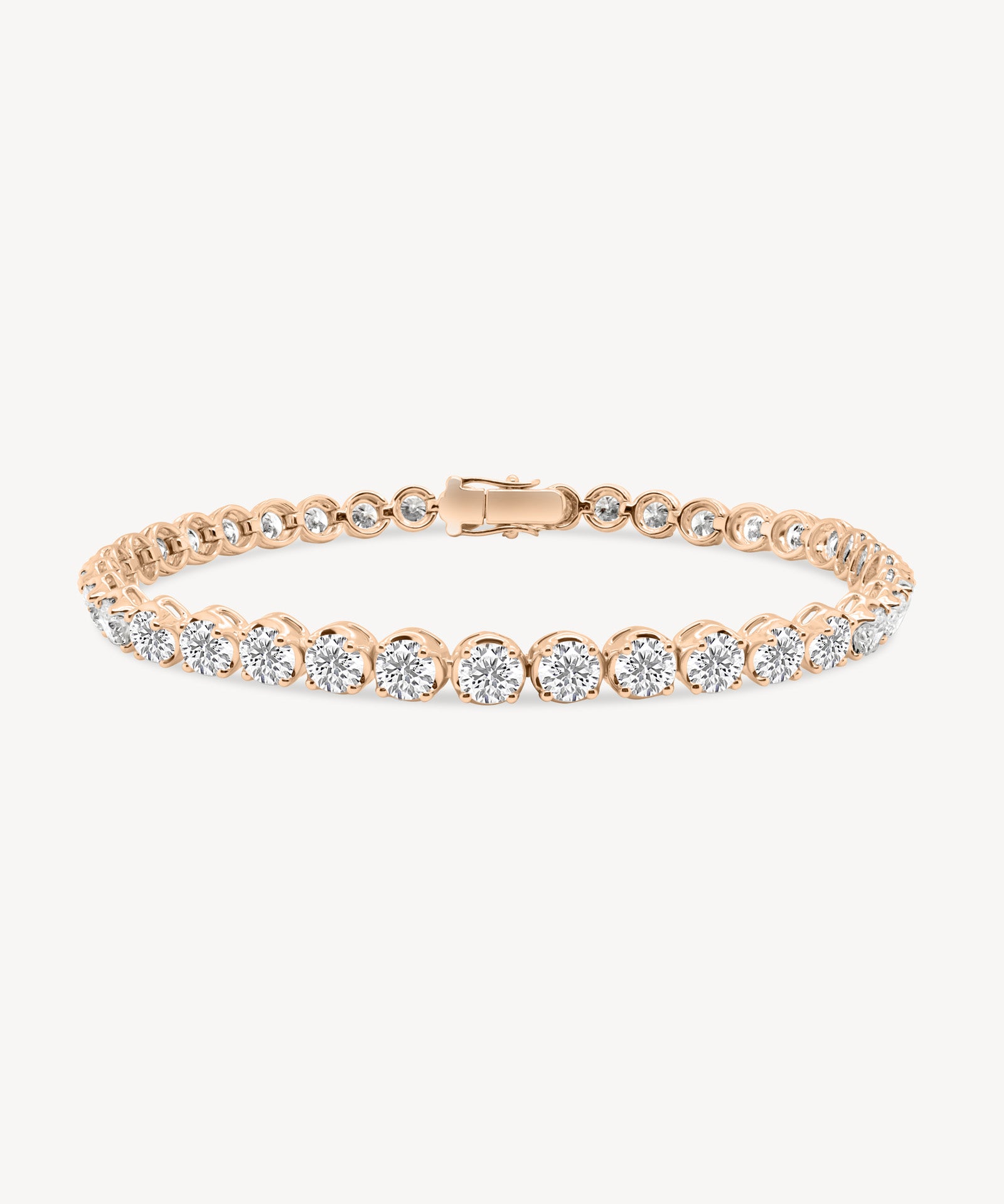 Round Cut Diamond Tennis Bracelet in Enlargement Setting