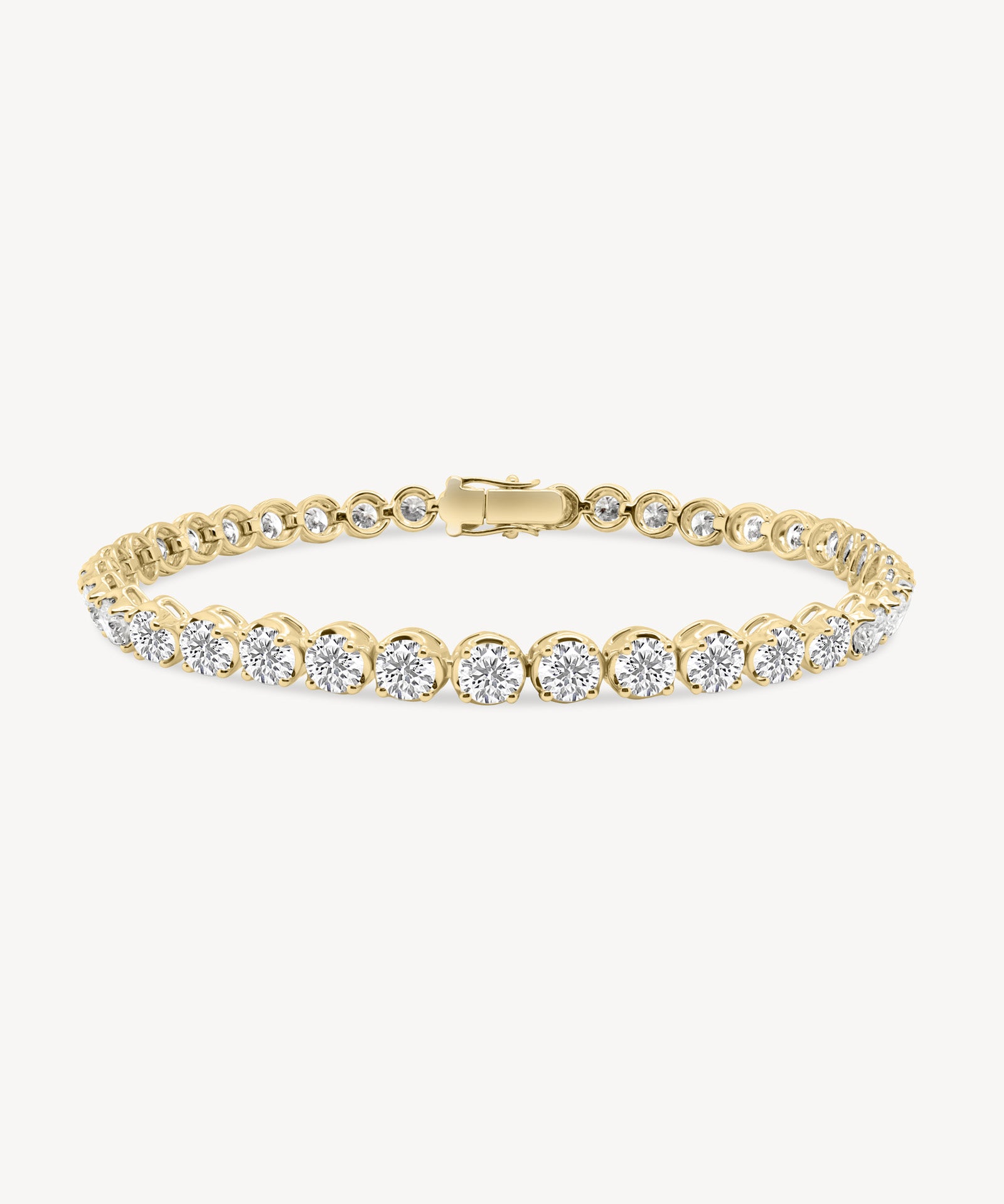 Round Cut Diamond Tennis Bracelet in Enlargement Setting