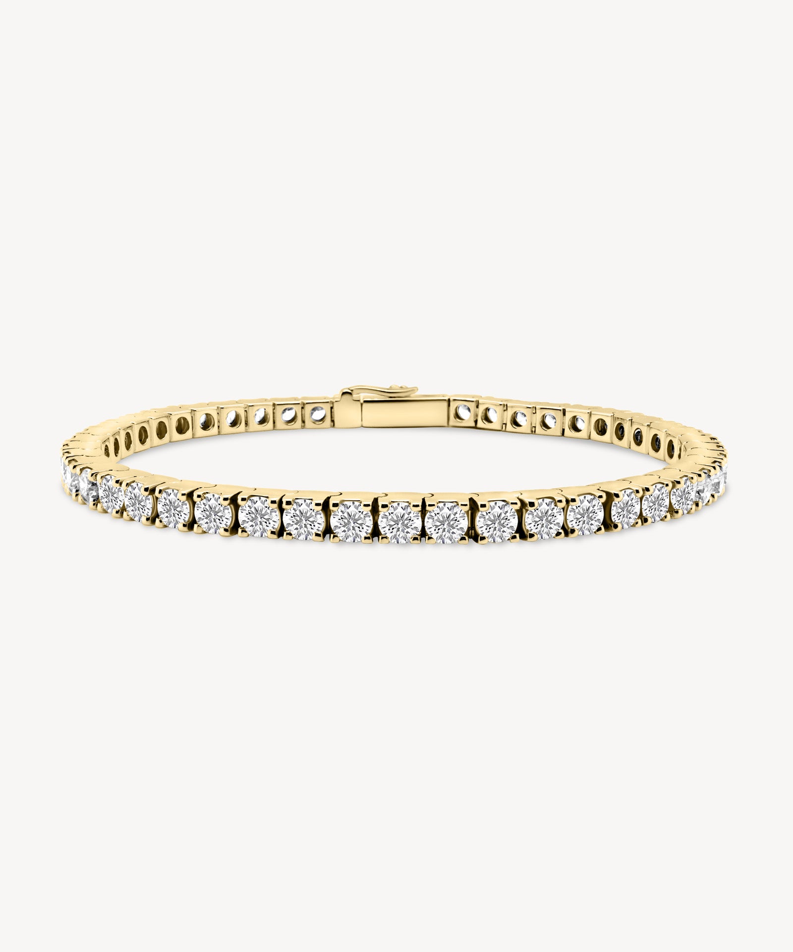 Round Cut Diamond Tennis Bracelet in Heavy Gold Setting