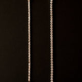 Round Cut Diamond Tennis Bracelet in Four-Prong Setting