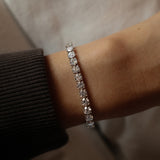Round Cut Diamond Tennis Bracelet in Four-Prong Setting