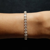 Round Cut Diamond Tennis Bracelet in Four-Prong Setting