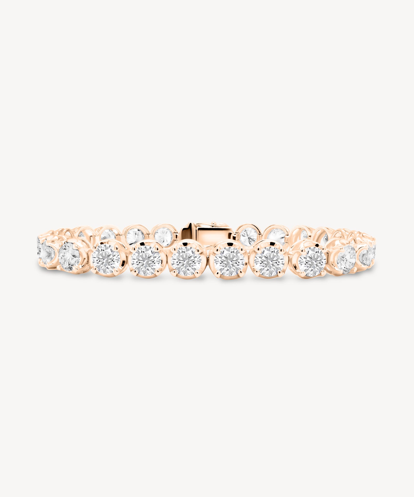 Round Cut Diamond Tennis Bracelet in Enlargement Setting