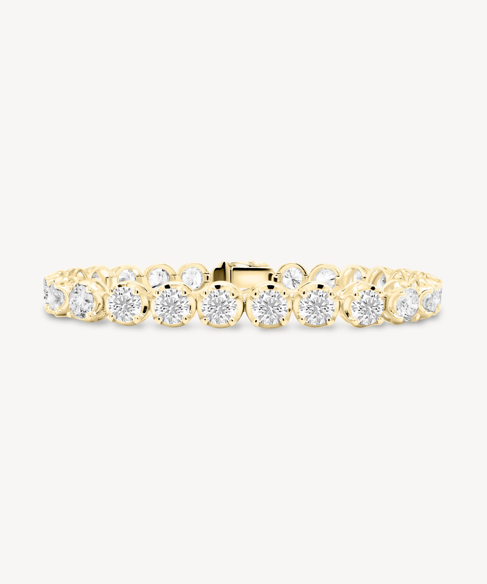 Round Cut Diamond Tennis Bracelet in Enlargement Setting