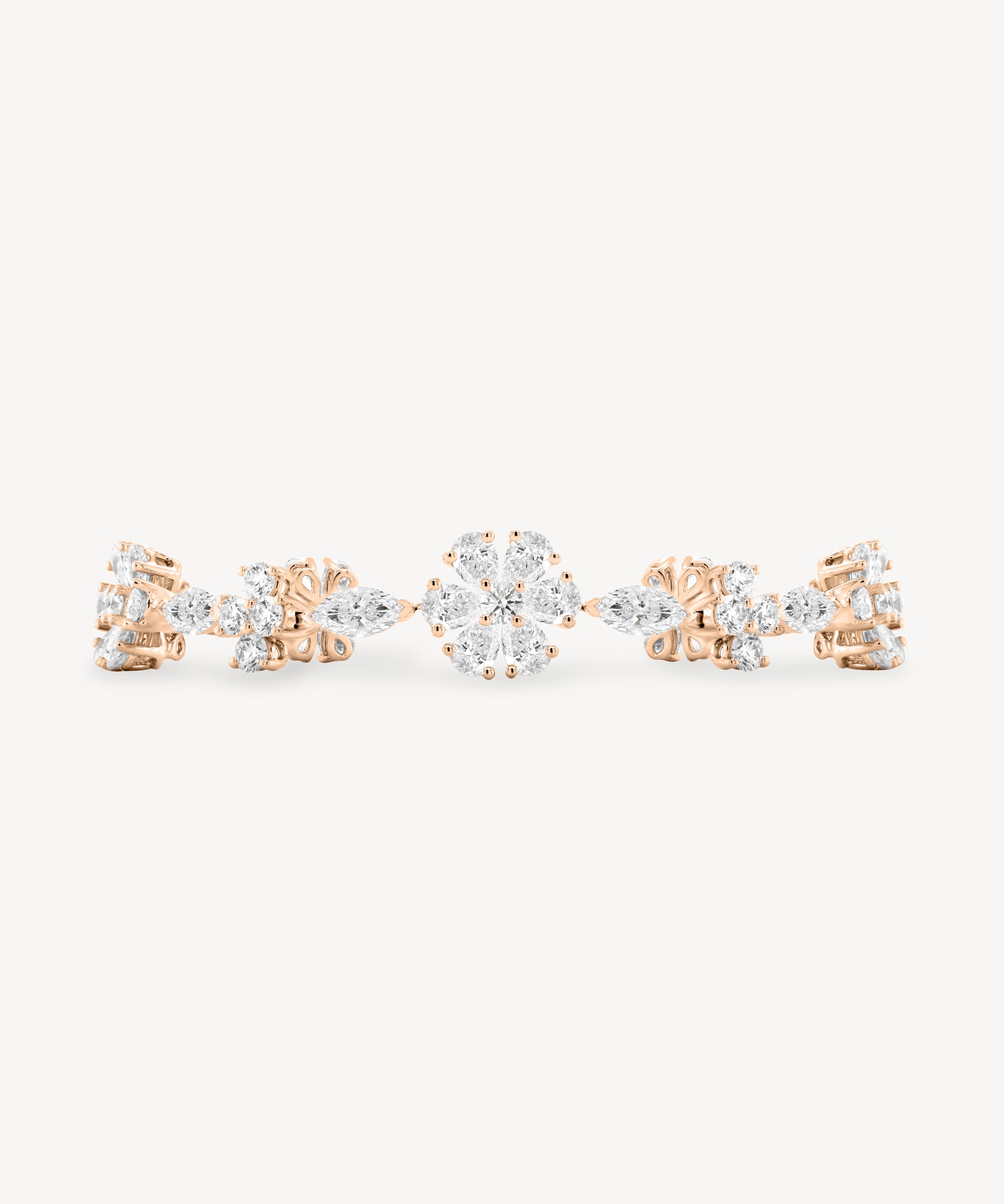 Diamond flower station bracelet in rose gold