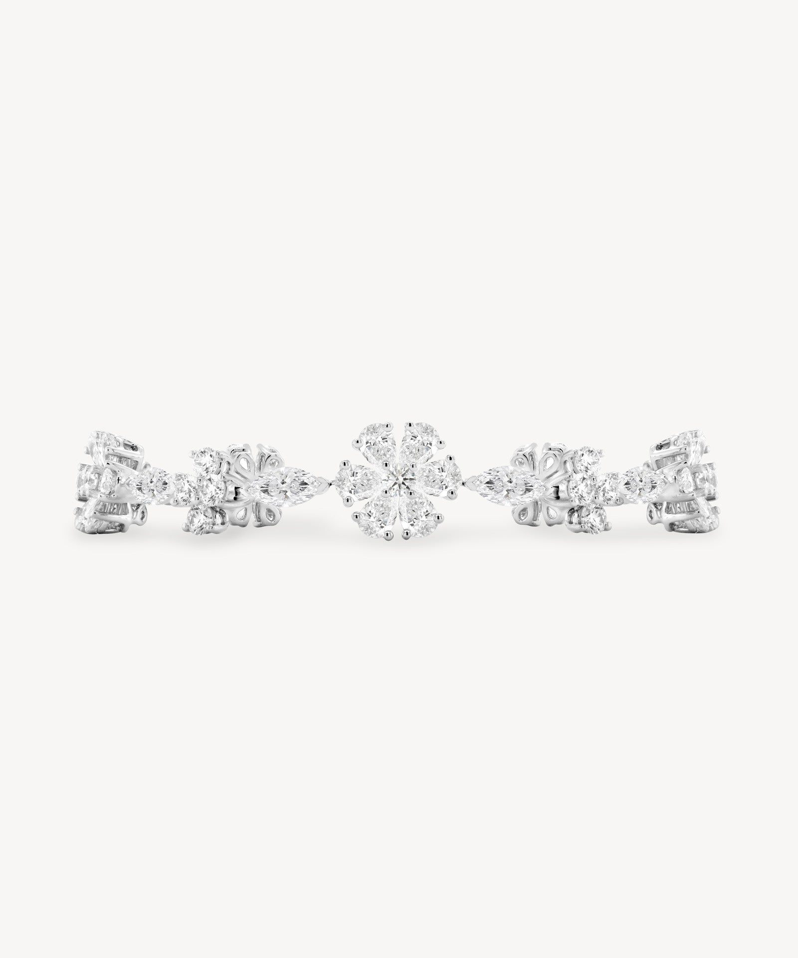 Diamond flower station bracelet in white gold