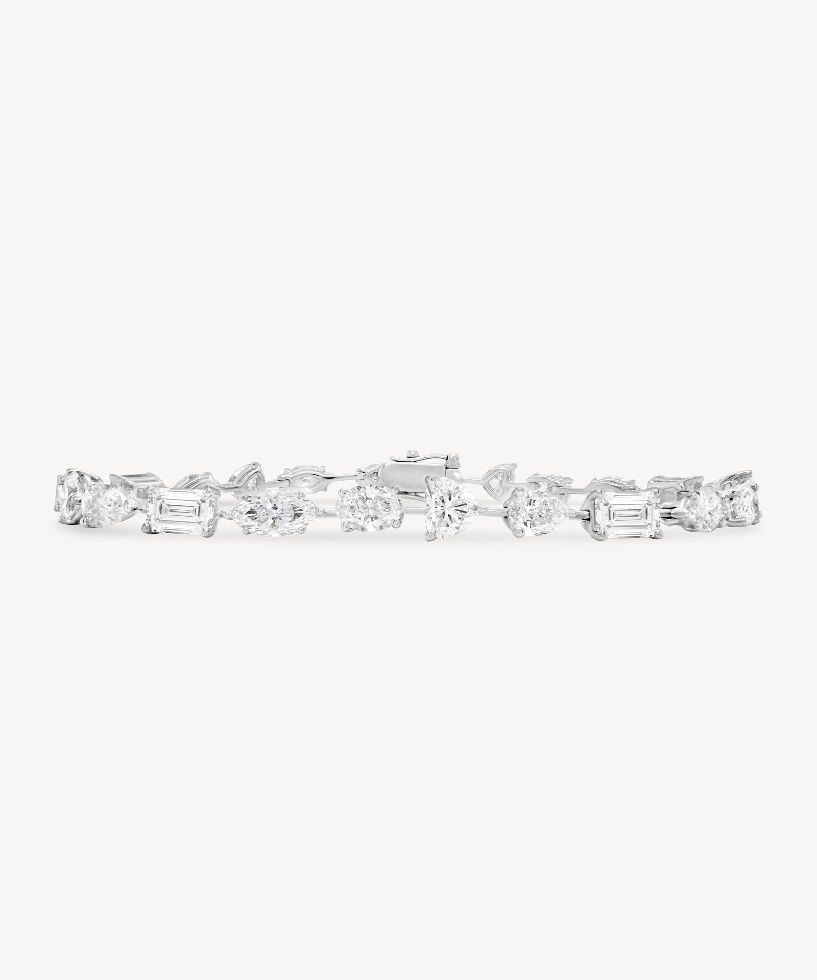 Alternating fancy cut diamond bracelet in white gold