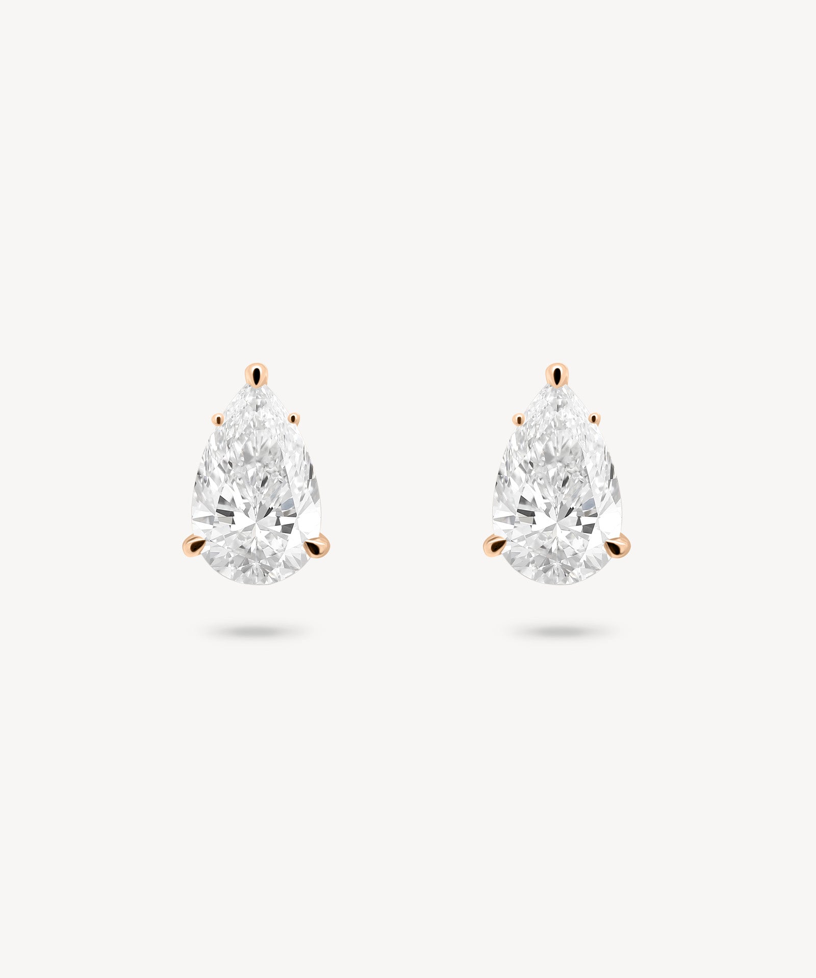 Pear Cut Diamond Solitaire Stud Earrings
