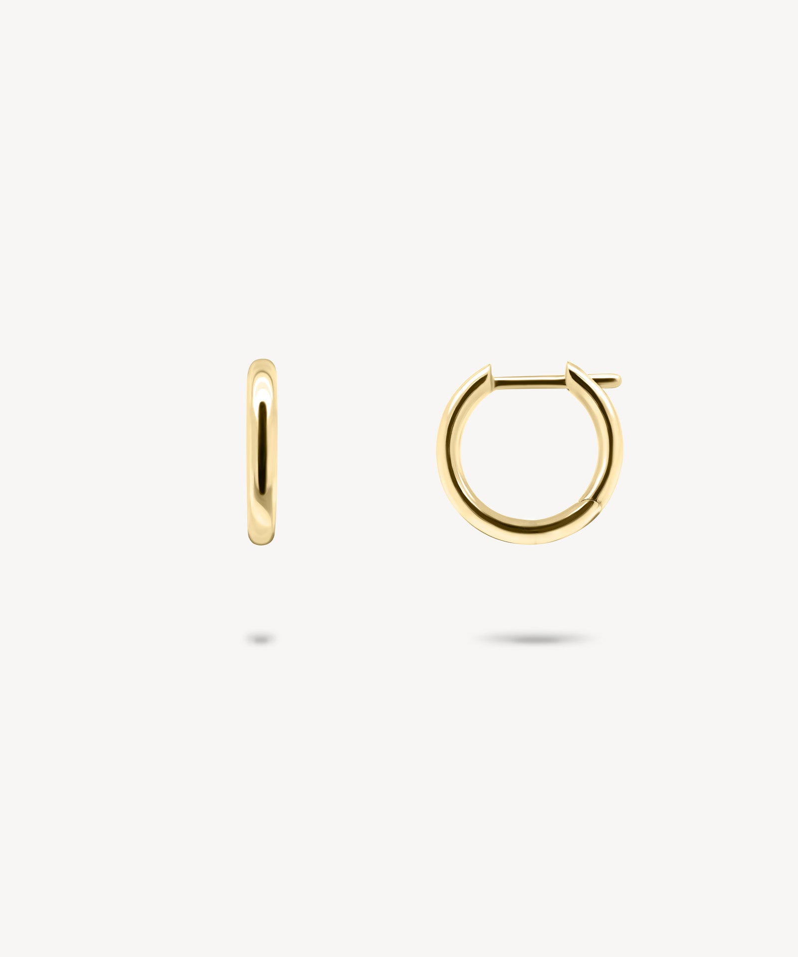 Gold huggie earrings in yellow gold