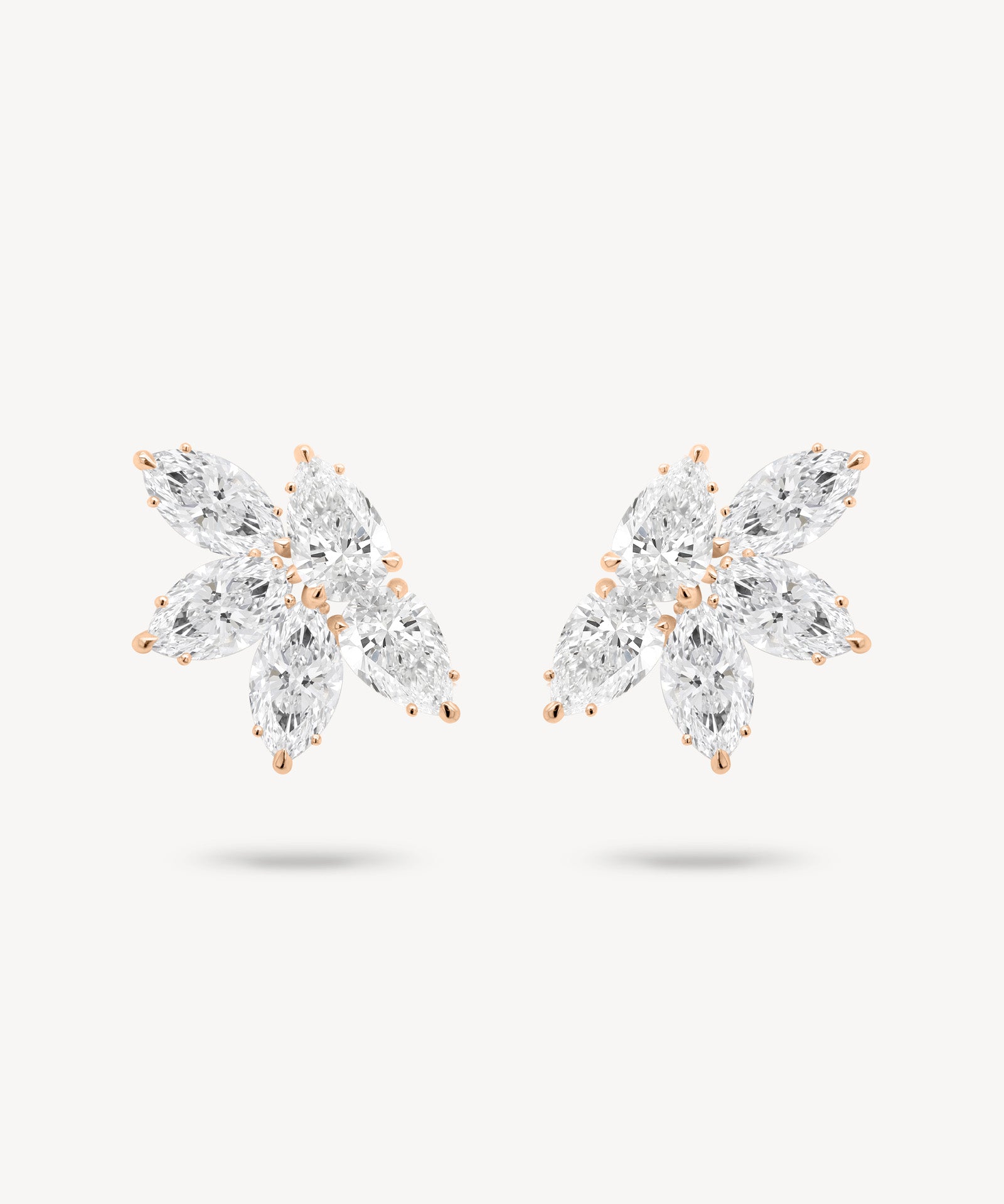 Marquise and pear cut diamond cluster stud earrings in rose gold