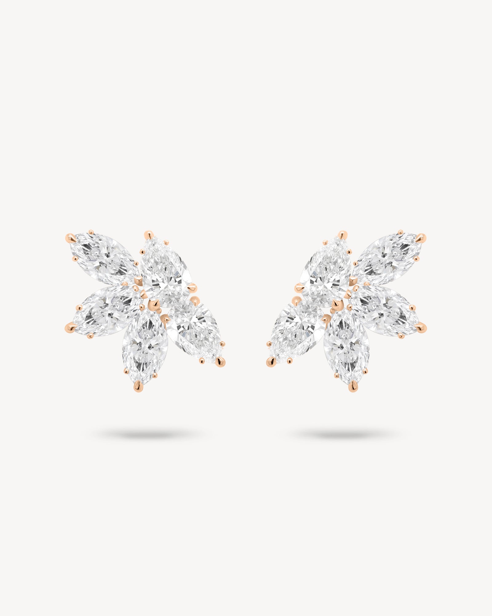 Marquise and pear cut diamond cluster stud earrings in rose gold