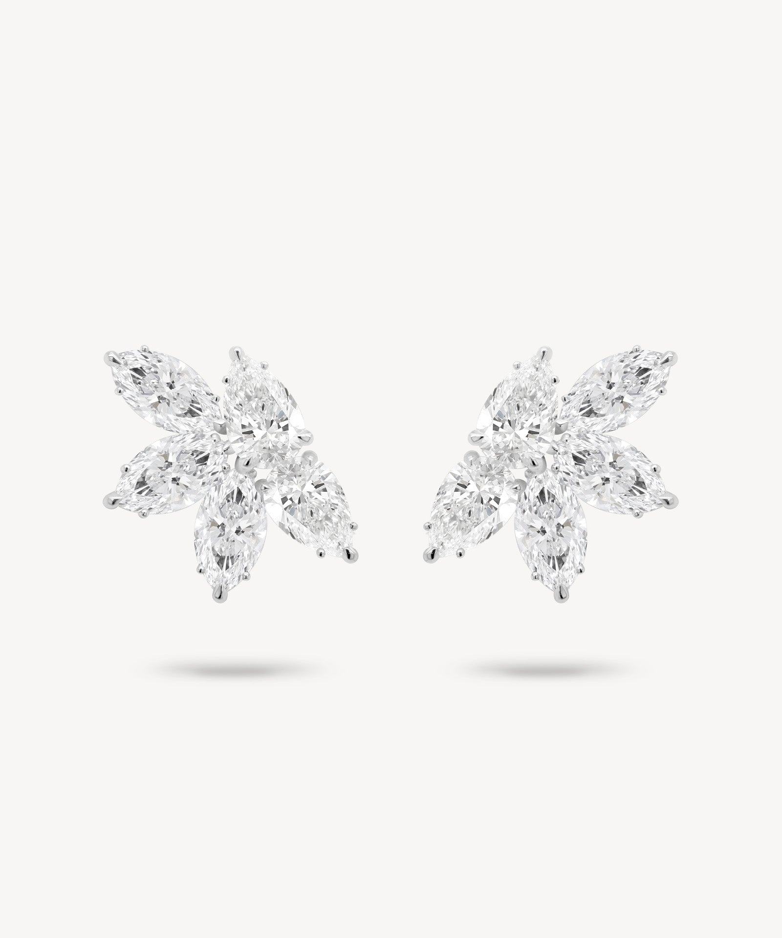 Marquise and pear cut diamond cluster stud earrings in white gold