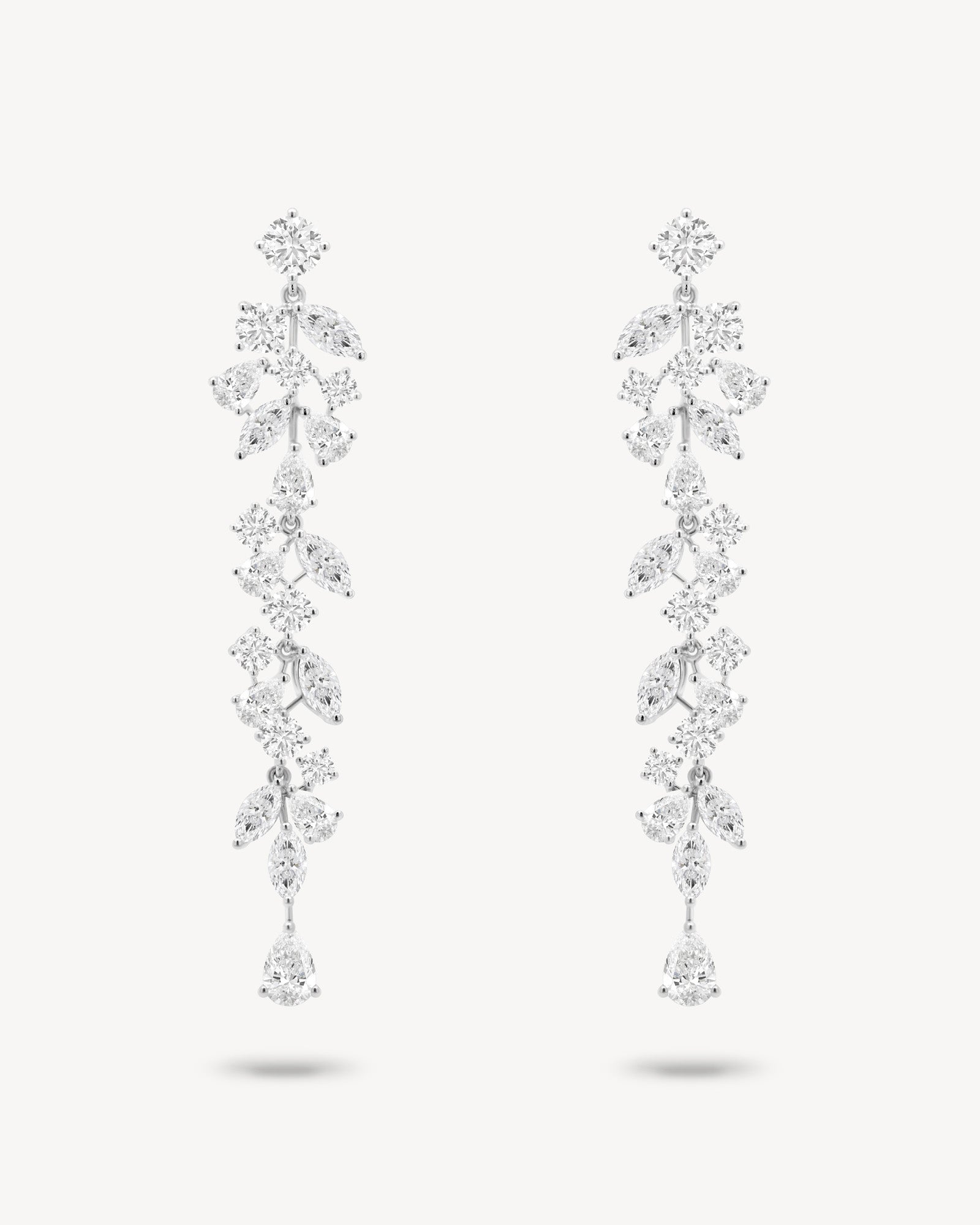 Mixed diamond long drop vine earrings in white gold