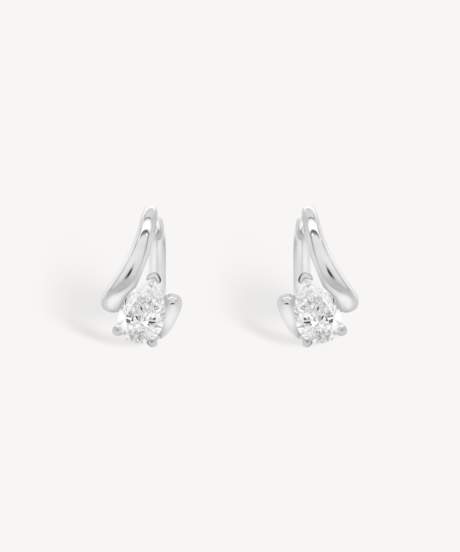 Floating Pear Diamond Huggie Earrings