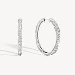 Spiral round cut diamond hoop earring in white gold