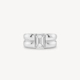 Emerald Cut diamond double gold band ring in 18K white gold set against a white background