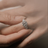 Round Cut Diamond Three Stone Ring With Pear Cut Side Stones