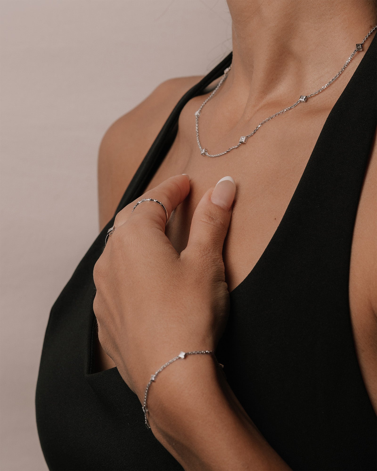 Princess cut diamond station necklace worn with a matching bracelet and rings, in white gold – tinxx jewelry