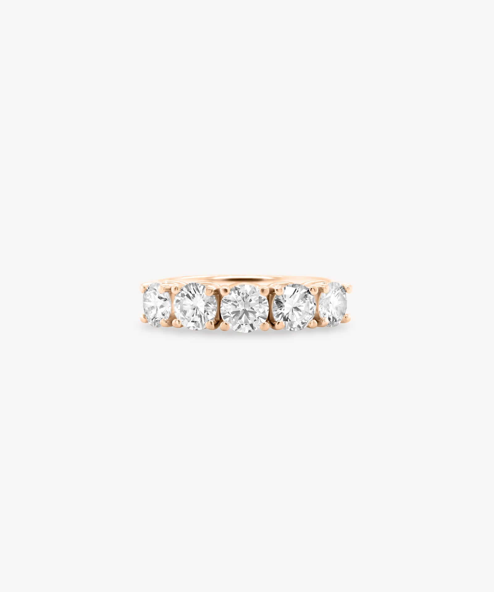 Round Cut Diamond Half Eternity Ring in Heart Setting