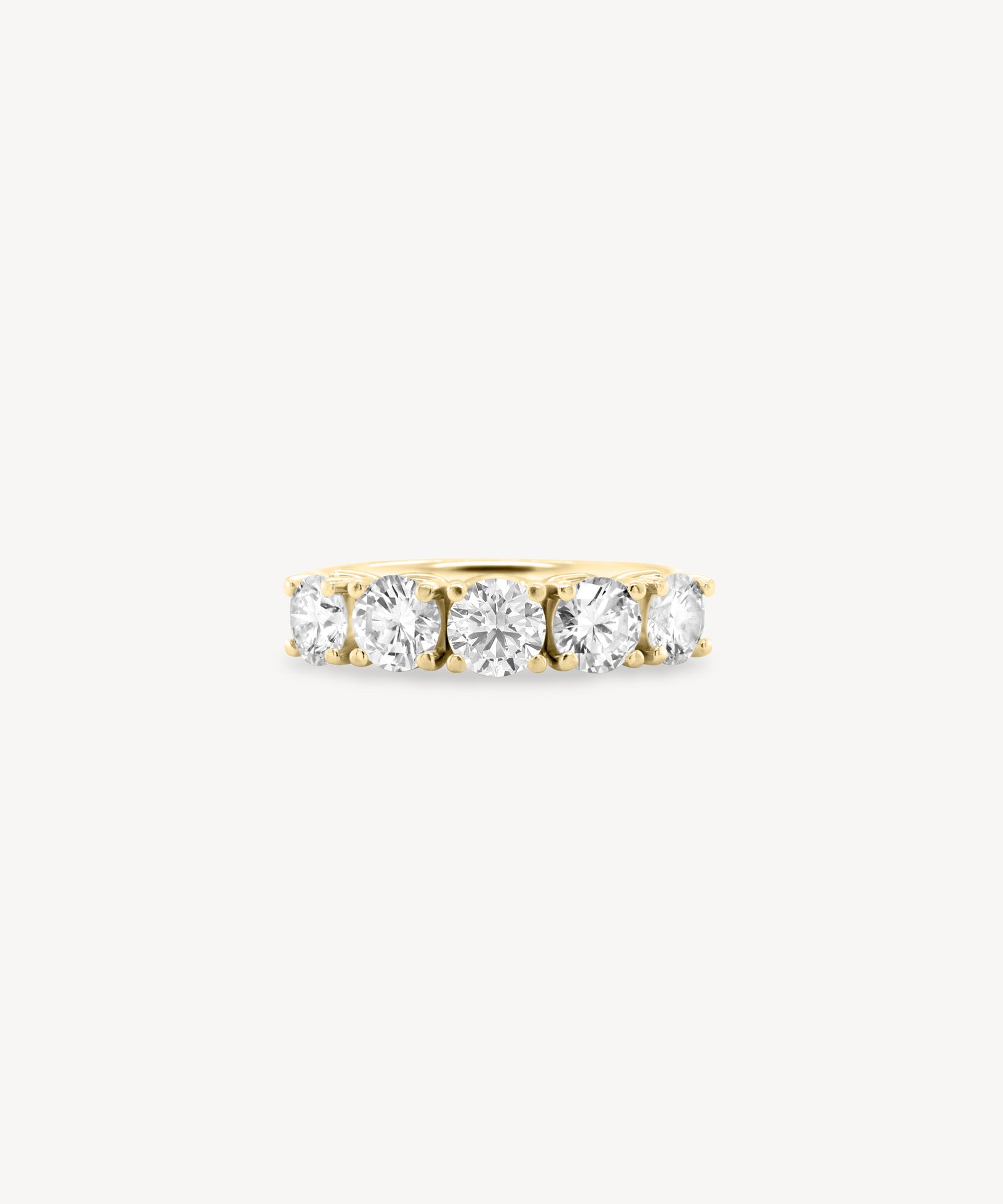 Round Cut Diamond Half Eternity Ring in Heart Setting