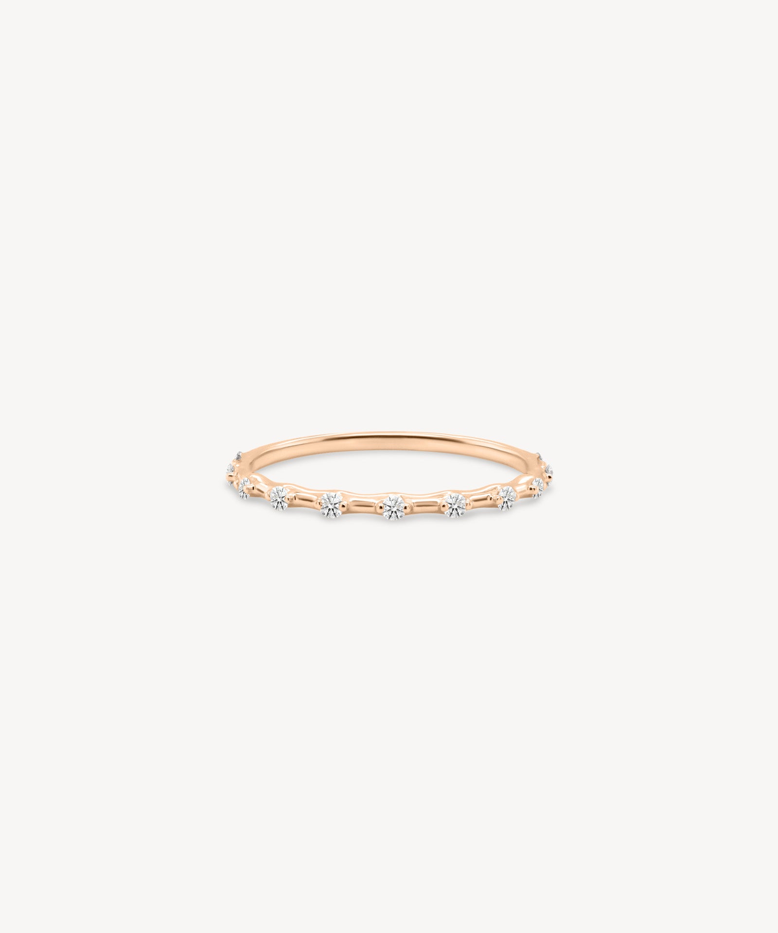 Dainty Round Cut Diamond Station Ring