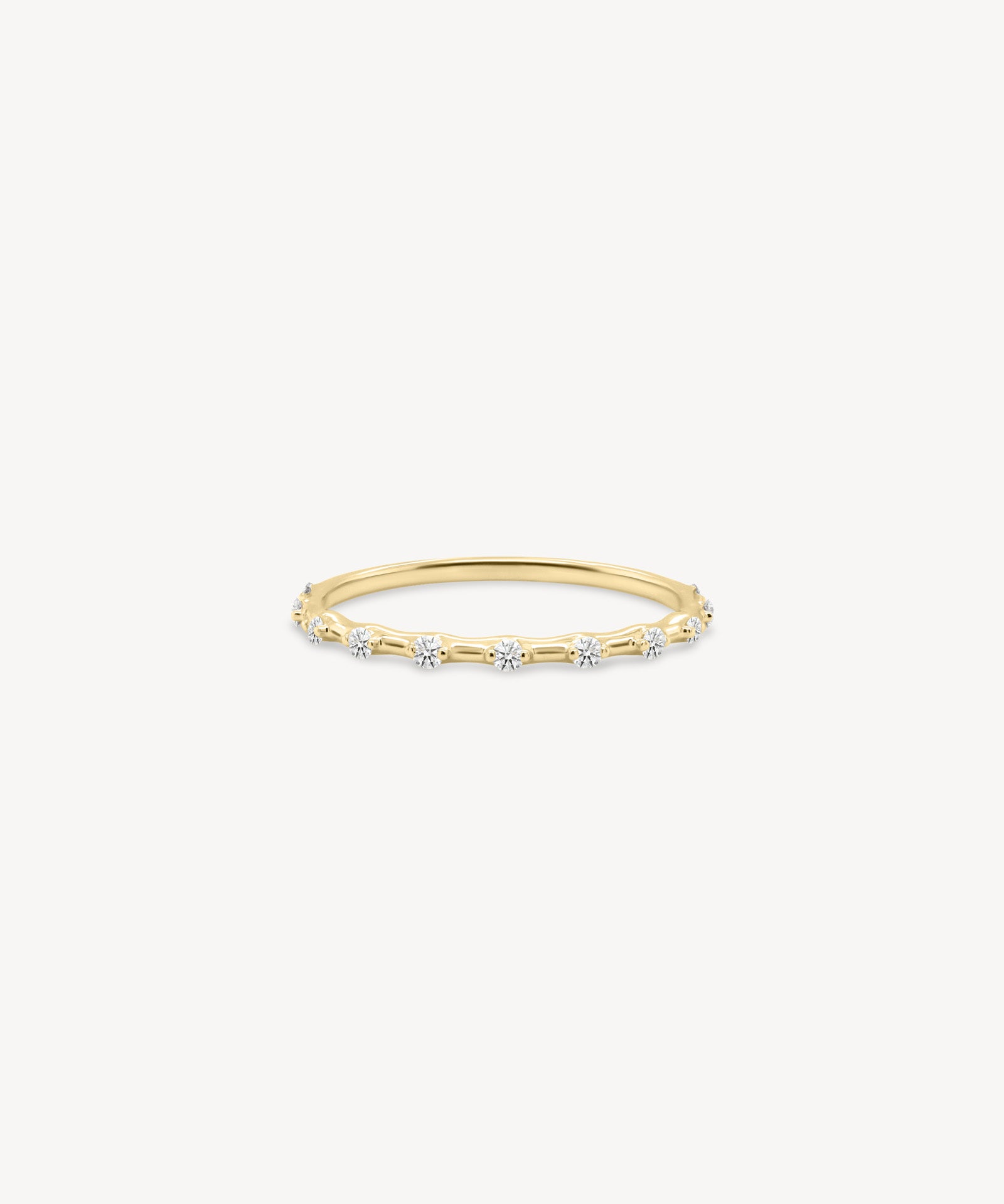 Dainty Round Cut Diamond Station Ring