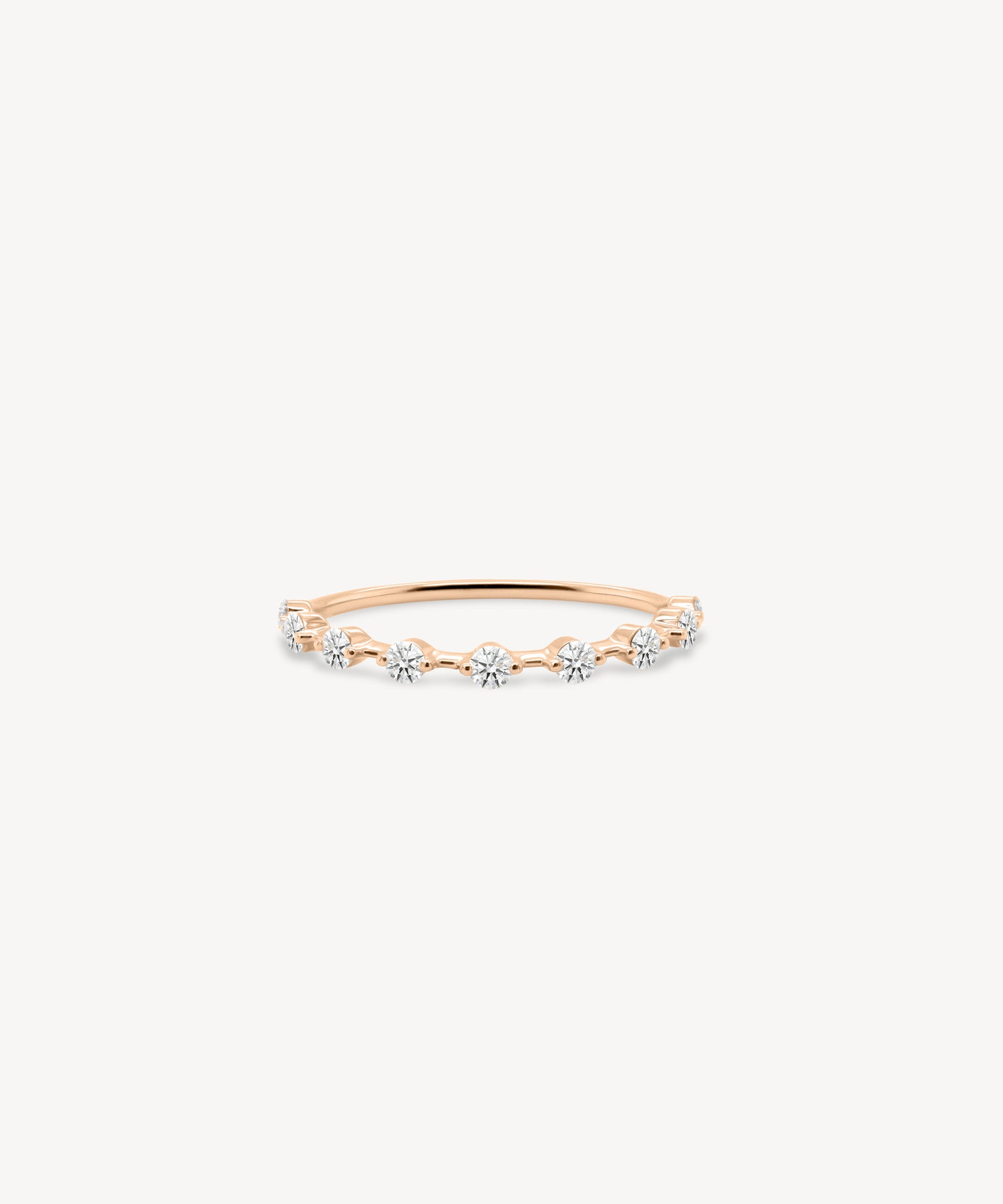 Dainty Round Cut Diamond Station Ring