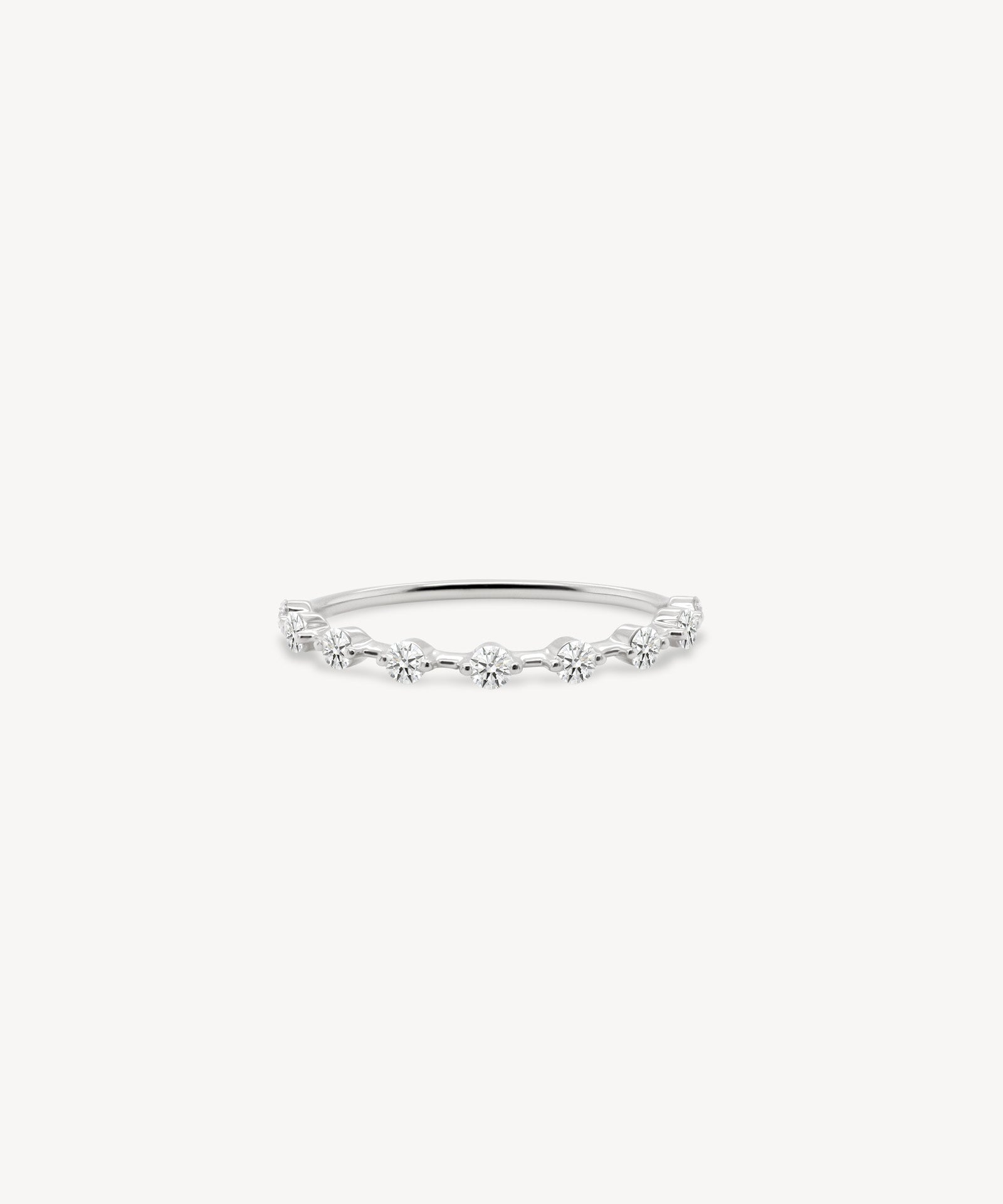 Dainty Round Cut Diamond Station Ring