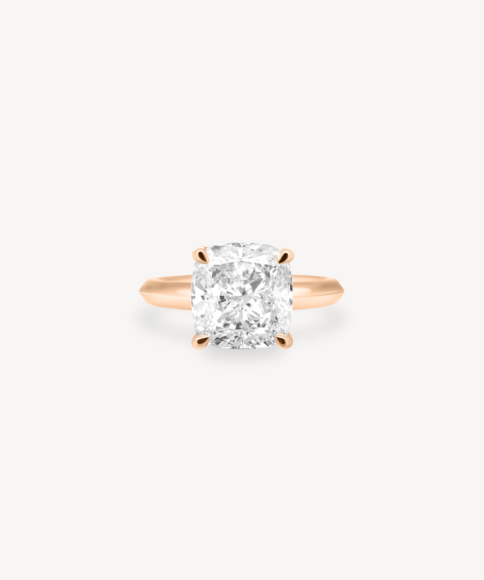 Cushion Cut Solitaire Ring in Knife Edge Setting