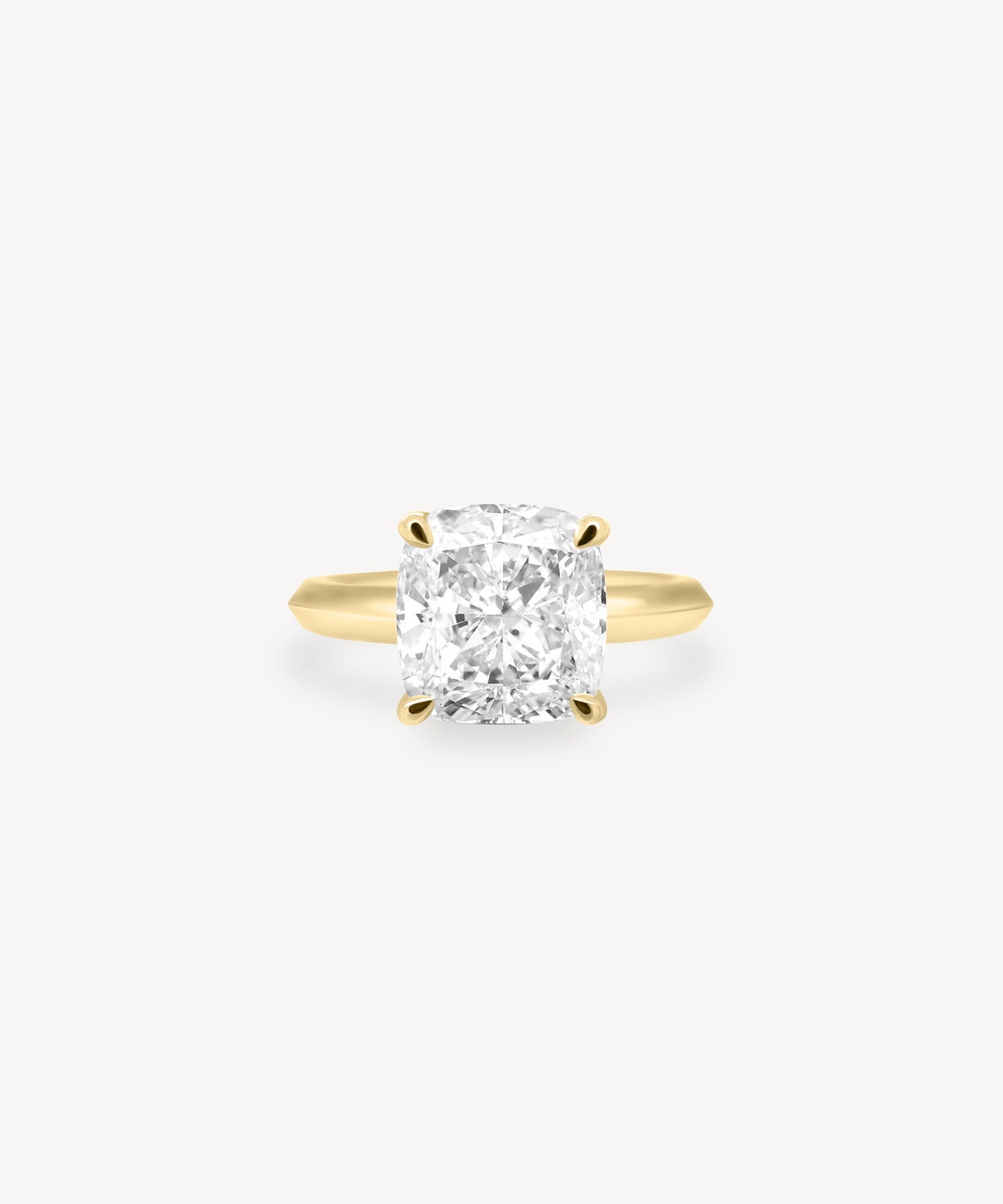 Cushion Cut Solitaire Ring in Knife Edge Setting