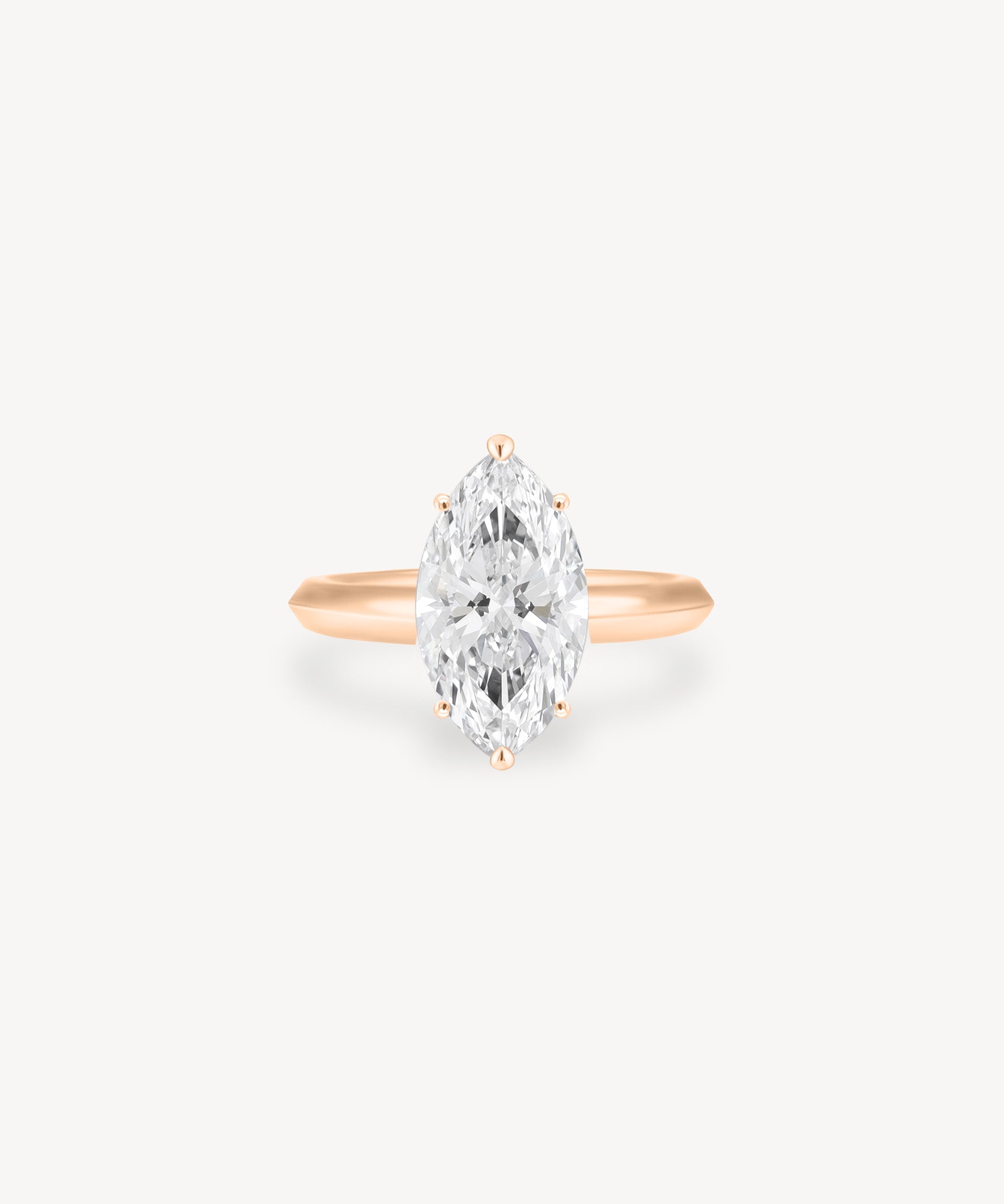 Marquise Cut Solitaire Ring in Knife Edge Setting
