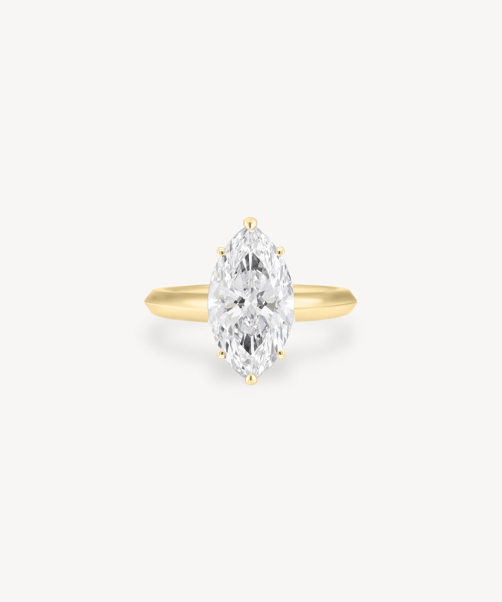 Marquise Cut Solitaire Ring in Knife Edge Setting