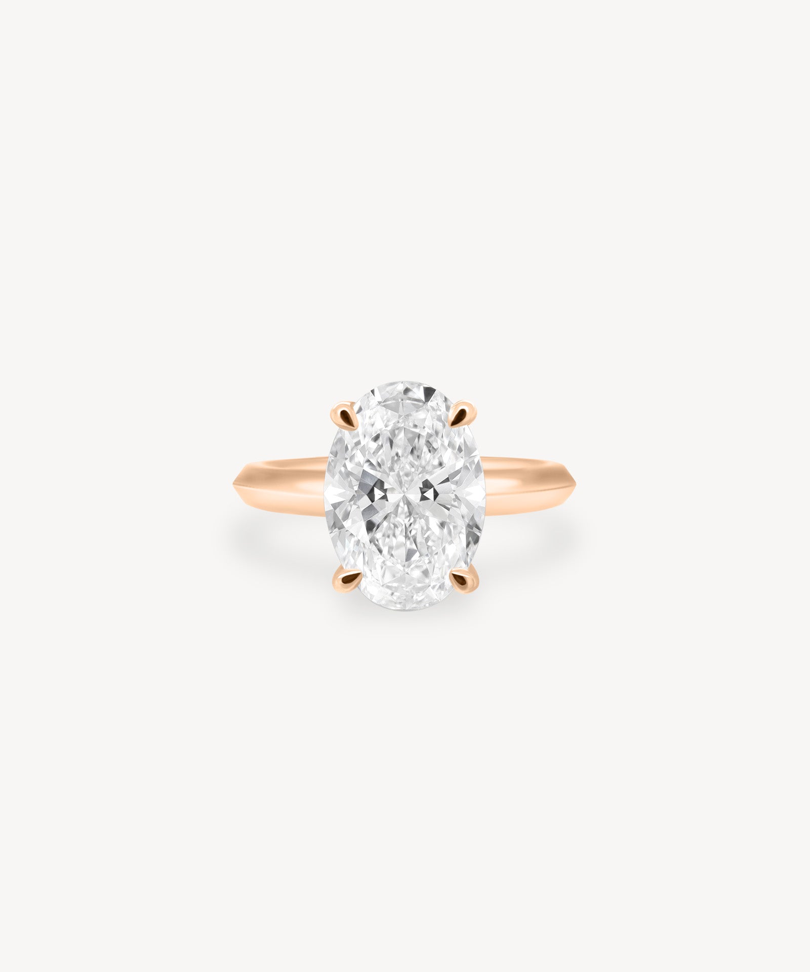 Oval Cut Solitaire Ring in Knife Edge Setting