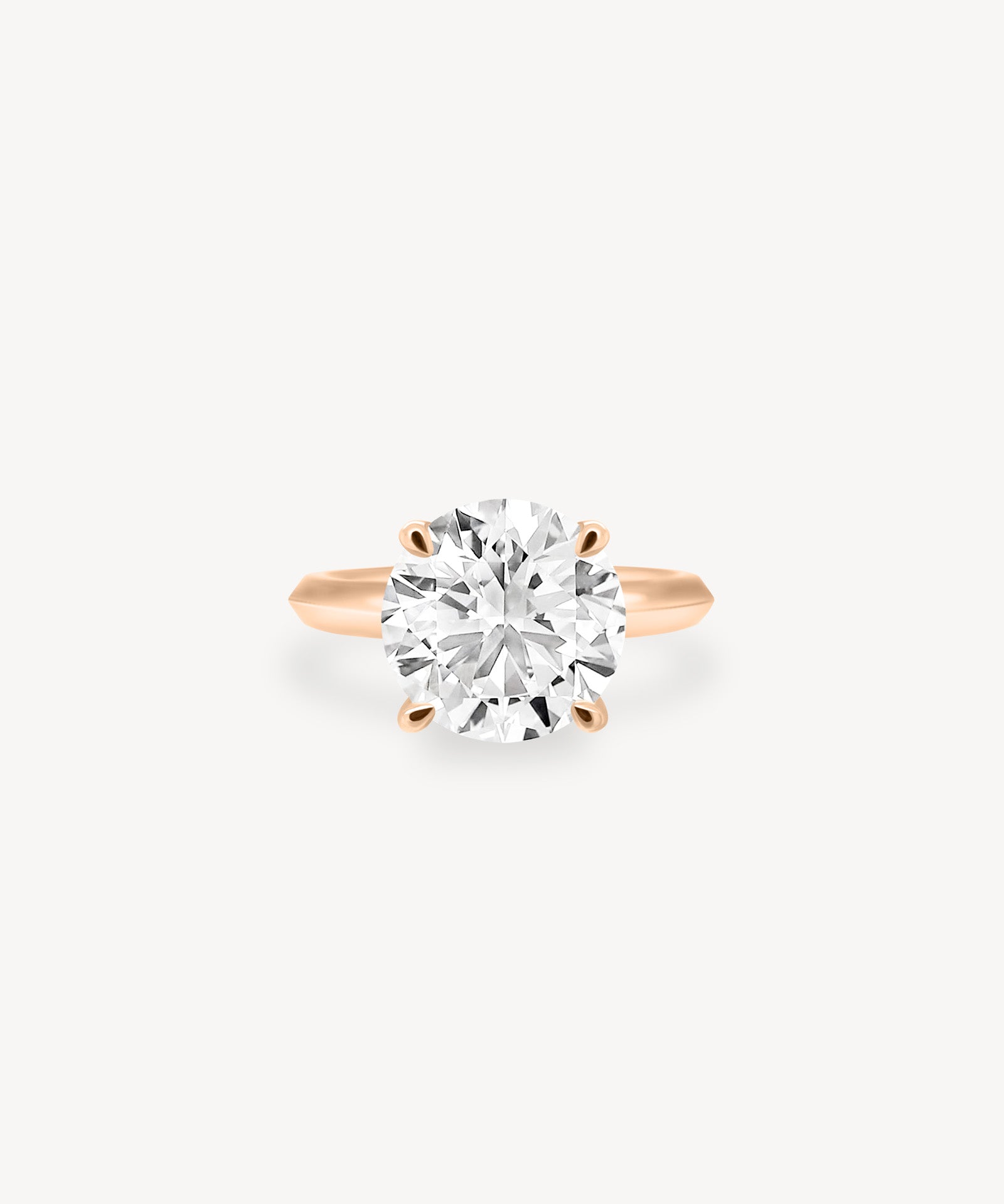 Round Cut Solitaire Ring in Knife Edge Setting