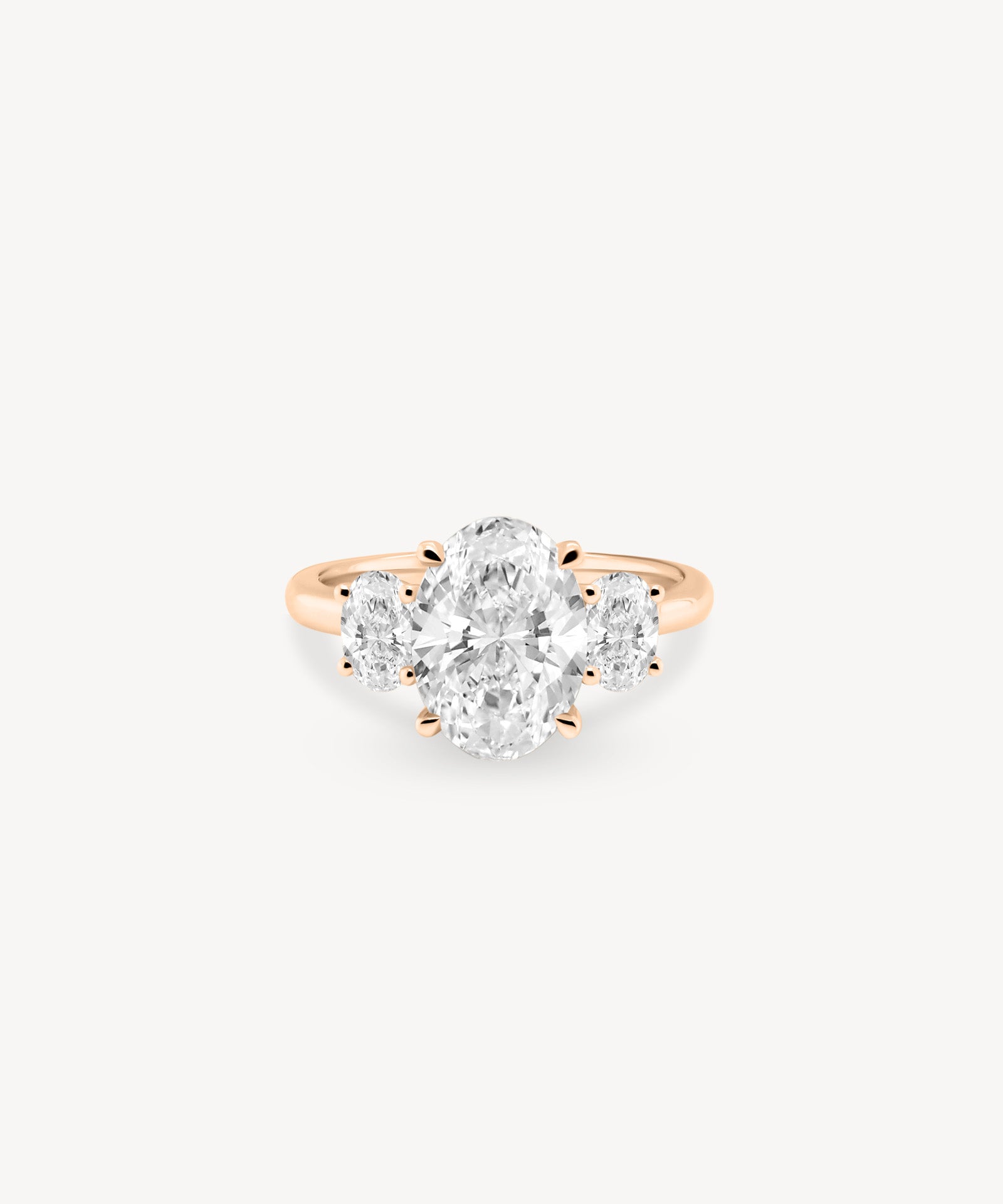 Oval Cut Diamond Three Stone Ring With Oval Cut Side Stones