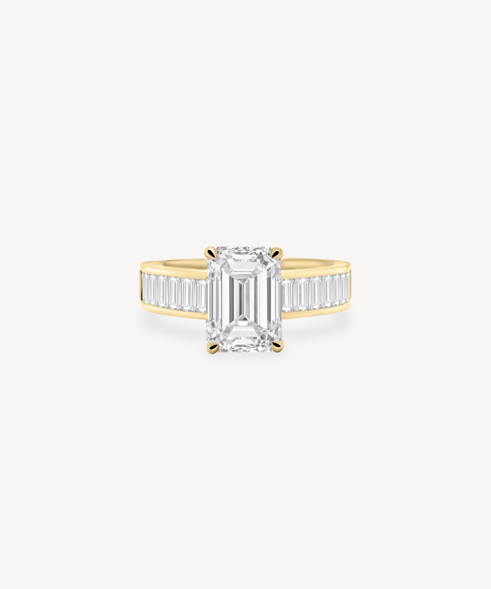 Emerald Cut Diamond Ring with Baguette Cut Band in Channel Setting