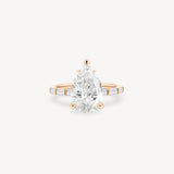 Pear and Baguette Cut Diamond Ring in Bar Setting