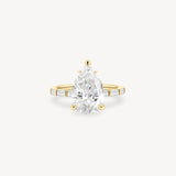 Pear and Baguette Cut Diamond Ring in Bar Setting