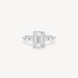 Emerald and Baguette Cut Diamond Ring in Bar Setting