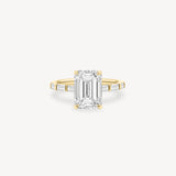 Emerald and Baguette Cut Diamond Ring in Bar Setting