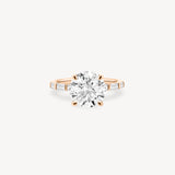 Round and Baguette Cut Diamond Ring in Bar Setting