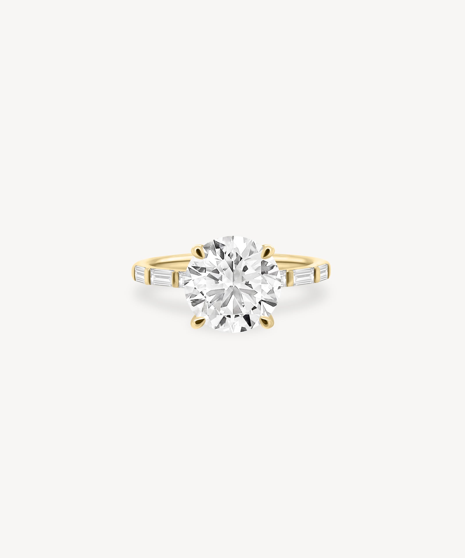 Round and Baguette Cut Diamond Ring in Bar Setting
