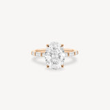 Oval and Baguette Cut Diamond Ring in Bar Setting