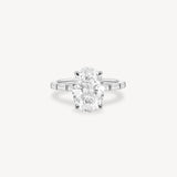 Oval and Baguette Cut Diamond Ring in Bar Setting