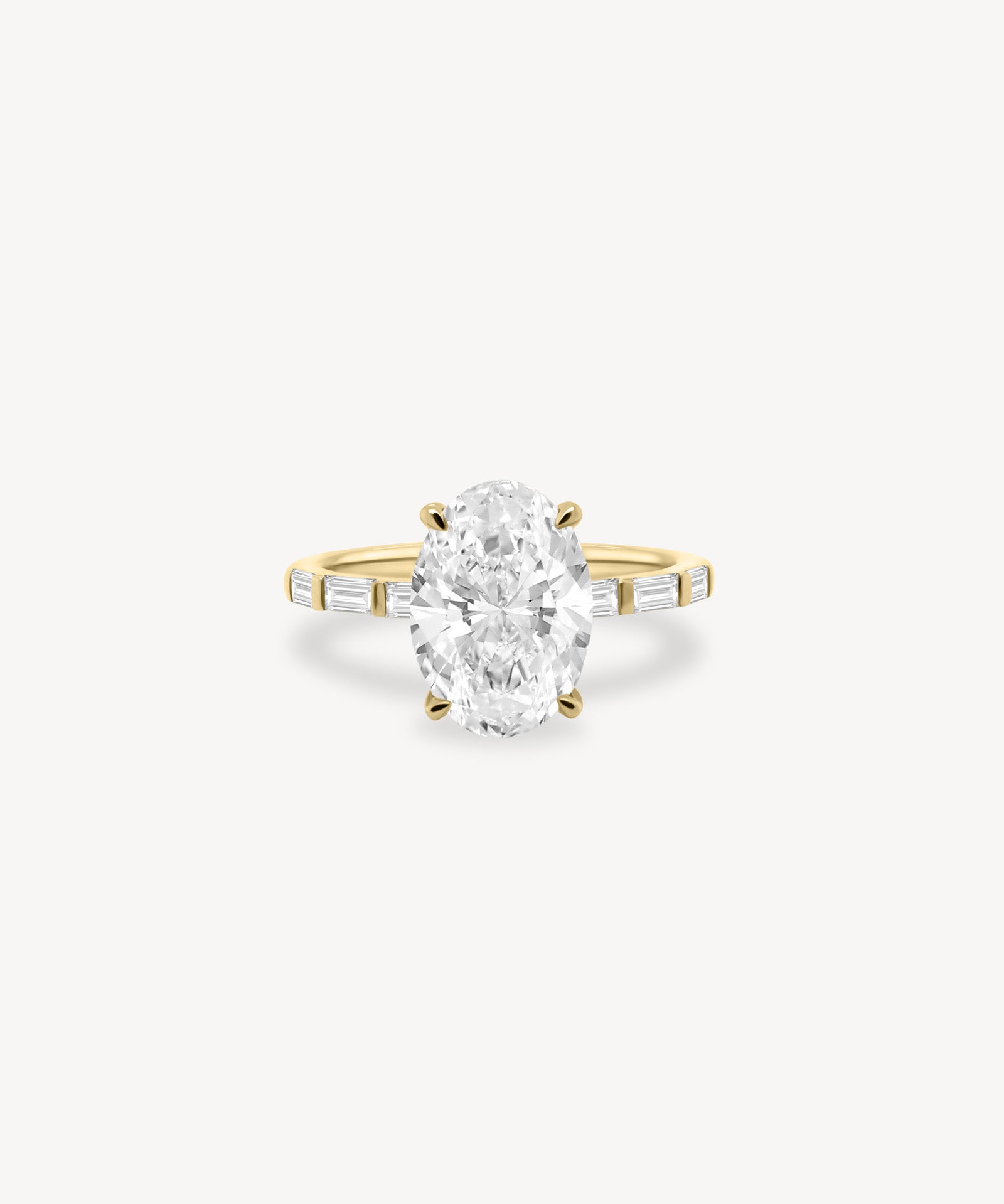 Oval and Baguette Cut Diamond Ring in Bar Setting