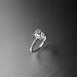 Oval Cut Diamond Pavé Ring in Cathedral Setting with Hidden Halo