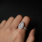 Pear Cut Diamond Halo Pavé Ring in Cathedral Setting